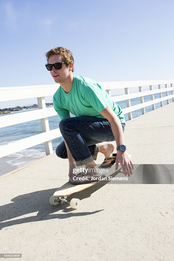 A young man on a skateboard.