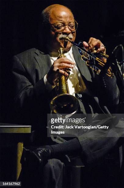 American jazz musician Clark Terry plays trumpet and flluegelhorn during a performance at the Jack Kleinsinger's Highlights in Jazz 'Salute to Jimmy...