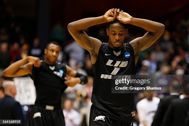 Jamal Olasewere of the LIU Brooklyn Blackbirds reacts during the second half of their 55 to 68 loss to the James Madison Dukes during the first round...