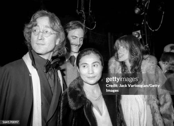 Married musicians John Lennon and Yoko Ono , along similarly married musicians James Taylor and Carly Simon attend the opening night of the Merce...