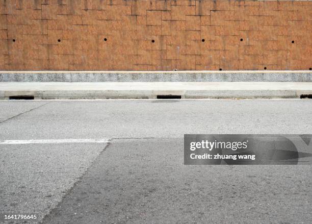 city pavement in singapore at daytime - kerb stock pictures, royalty-free photos & images