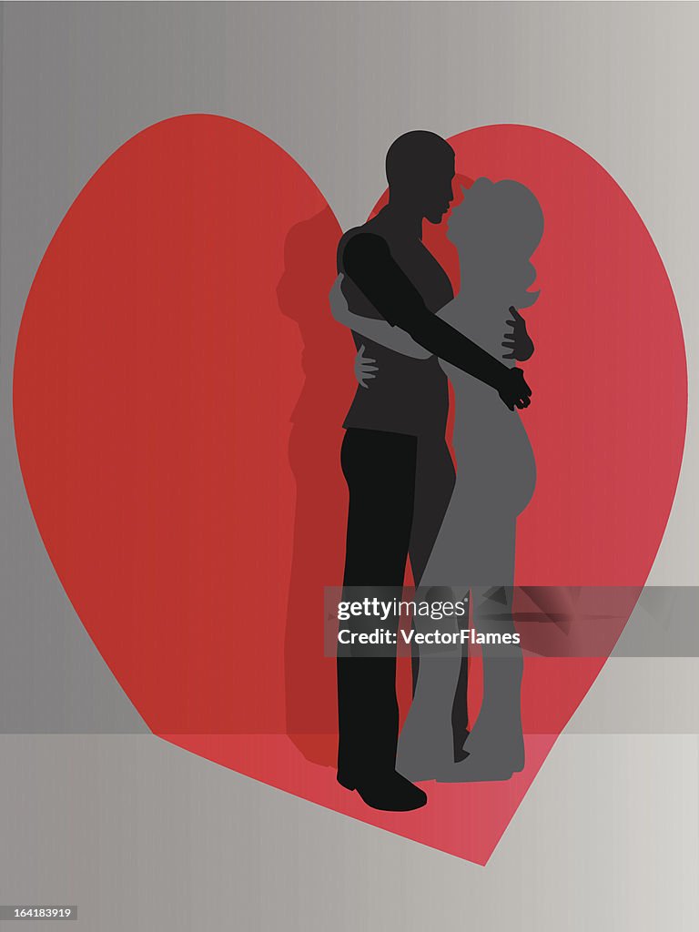Couple in front of Heart