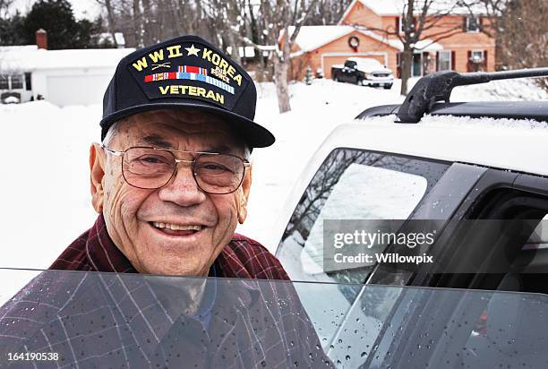 smiling wwii and korean war military veteran - army shirt stock pictures, royalty-free photos & images