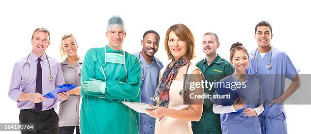 uk medizinische team - nurse and portrait and white background and smiling and female and looking at camera stock-fotos und bilder