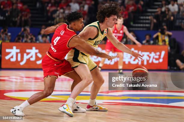 Josh Giddey of Australia handles the ball against Maodo Lo of Germany during the FIBA Basketball World Cup Group E game between Australia and Germany...