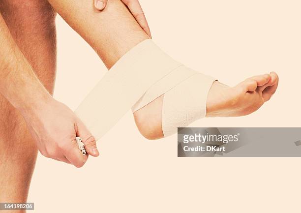 sports trauma of a foot. sprained anklebone - human foot anatomy stock pictures, royalty-free photos & images