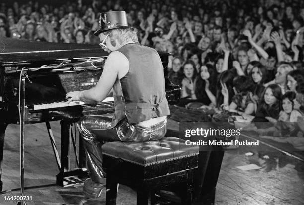 English singer-songwriter Elton John performing on stage, 1973.