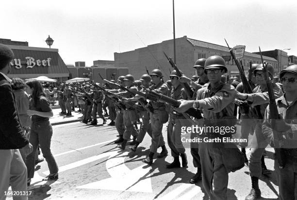 California National Guardsmen, bayonets at the ready, block the street during protests near People's Park on the campus of the University of...