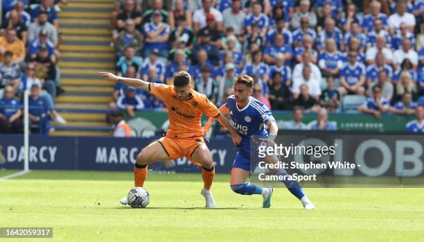 Hull City's Ruben Vinagre battles with Leicester City's Yunus Akgun during the Sky Bet Championship match between Leicester City and Hull City at The...