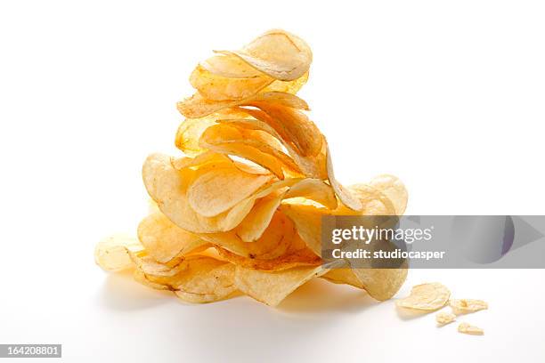 pile of potato chips - prepared potato bildbanksfoton och bilder