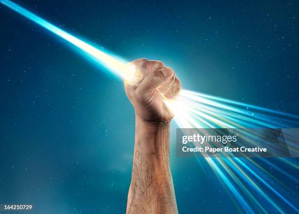hand holding light laser beam that bursts out - lazer tag bildbanksfoton och bilder