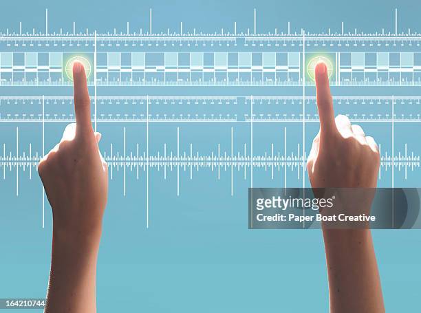 hand touching two points on digital ruler - mass unit of measurement stock-fotos und bilder