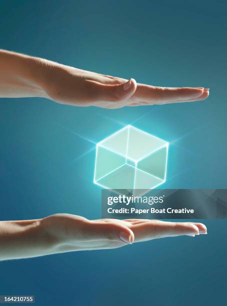 Cube Hand Photos and Premium High Res Pictures - Getty Images