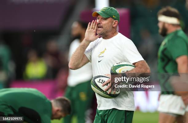 Jacques Nienaber the South Africa Springboks coach shouts instructions in the warm up during the Summer International match between New Zealand All...