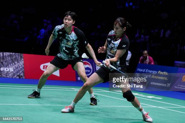 Seo Seung Jae and Chae Yu Jung of Korea compete in the Mixed Double Finals match against Zheng Siwei and Huang Yaqiong of China on day seven of the...