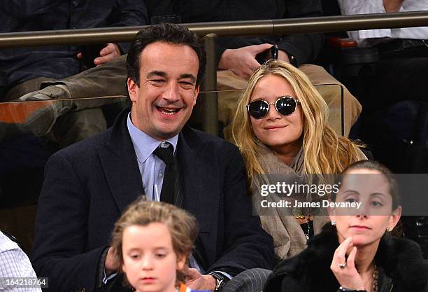 Olivier Sarkozy and Mary-Kate Olsen attend the Orlando Magic vs New York Knicks game at Madison Square Garden on March 20, 2013 in New York City.