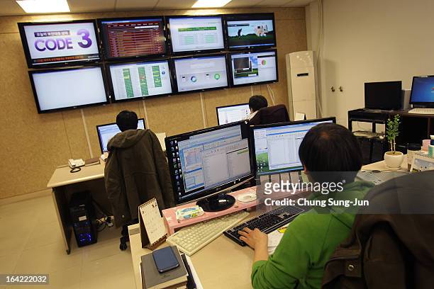 Reserchers inspecting for computer viruses at Hauri Inc. The IT security software vendor on March 21, 2013 in Seoul, South Korea. A cyber attack on...