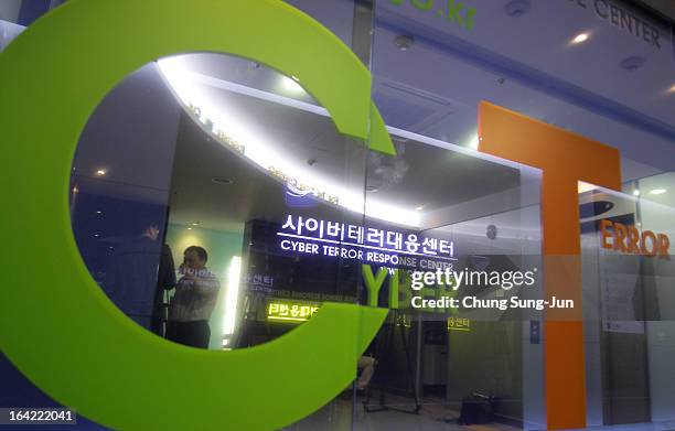 Man walks past at Cyber Terror Response Center at National Police Agency on March 21, 2013 in Seoul, South Korea. A cyber attack on the computer...