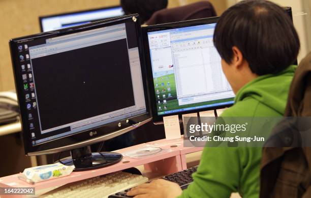 Researcher inspecting for computer viruses at Hauri Inc. The IT security software vendor on March 21, 2013 in Seoul, South Korea. A cyber attack on...