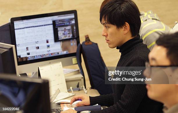 Researchers inspecting for computer viruses at Hauri Inc. The IT security software vendor on March 21, 2013 in Seoul, South Korea. A cyber attack on...