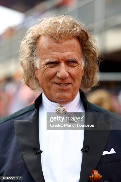 Andre Rieu looks on, on the grid prior to the F1 Grand Prix of The Netherlands at Circuit Zandvoort on August 27, 2023 in Zandvoort, Netherlands.