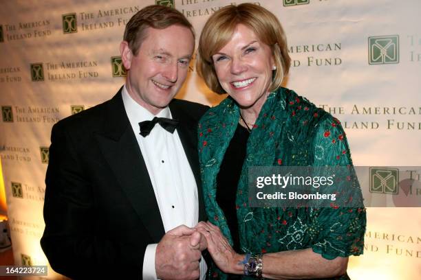 Enda Kenny, Ireland's prime minister, left, and Susan Brophy, managing director of legislative affairs at Glover Park Group, attend American Ireland...