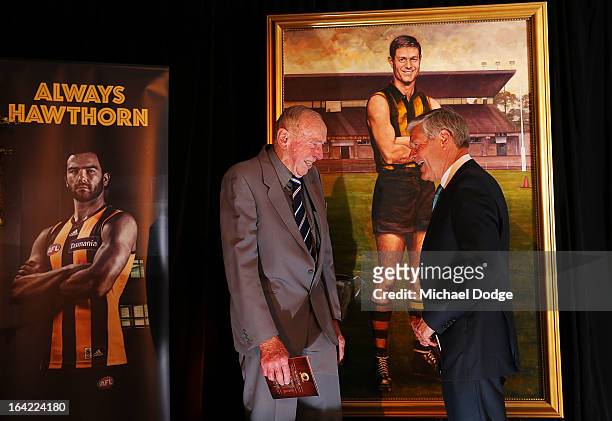 John Kennedy Snr and David Parkin stand in front of his portrait after being inducted as a legend during the Hawthorn Hawks Season Launch and Hall of...