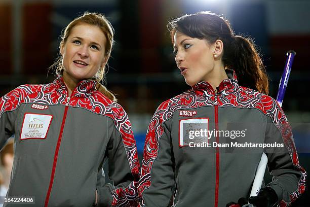 Margarita Fomina and Ekaterina Galkina of Russia speak between ends in the match between Japan and Russia on Day 5 of the Titlis Glacier Mountain...