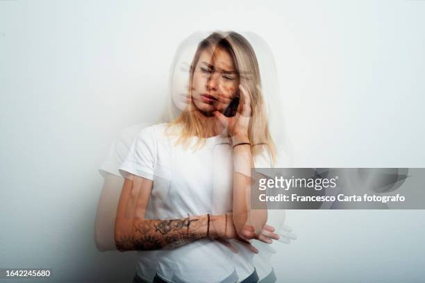woman and menopause - woman head in hands sad stock pictures, royalty-free photos & images