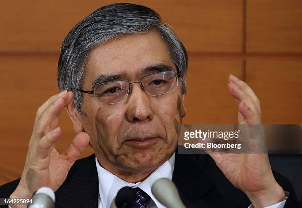 Haruhiko Kuroda, new governor of the Bank of Japan , gestures as he speaks during a news conference at the central bank's headquarters in Tokyo,...