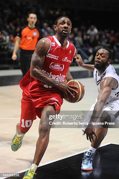 Troy Bell of Trenkwalder competes with Jacob Pullen of Oknoplast during the LegaBasket Serie A match between Oknoplast Bologna and Trenkwalder Reggio...