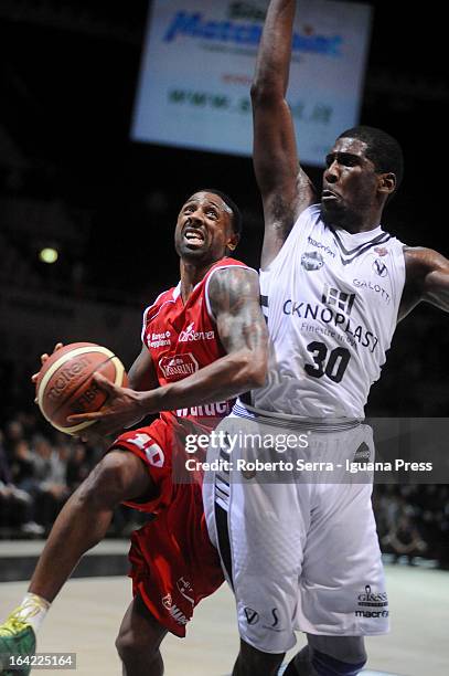 Troy Bell of Trenkwalder competes with Steven Smith of Oknoplast during the LegaBasket Serie A match between Oknoplast Bologna and Trenkwalder Reggio...