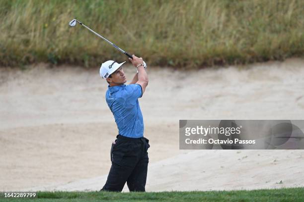 Thorbjorn Olesen of Denmark plays a shot from a bunker on the sixth hole during Day Four of the D+D Real Czech Masters at Albatross Golf Resort on...