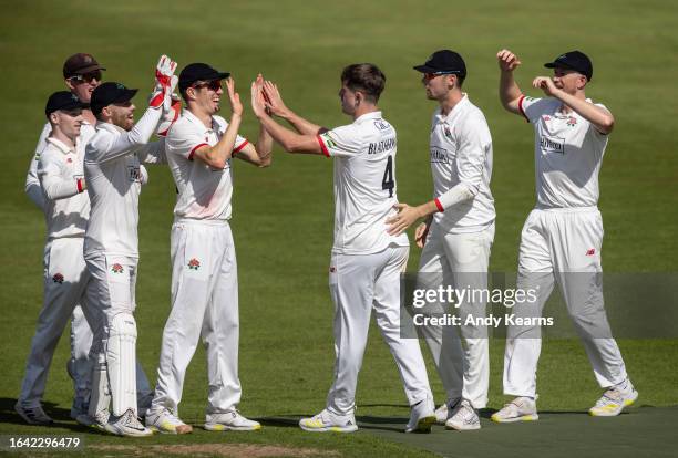 Jack Blatherwick of Lancashire celebrates after taking the wicket of Luke Procter of Northamptonshire during the LV= Insurance County Championship...