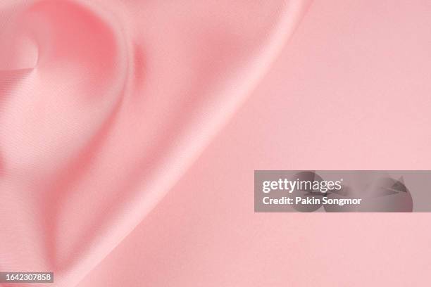 pink color fabric cloth polyester texture and textile background. - pink jersey bildbanksfoton och bilder