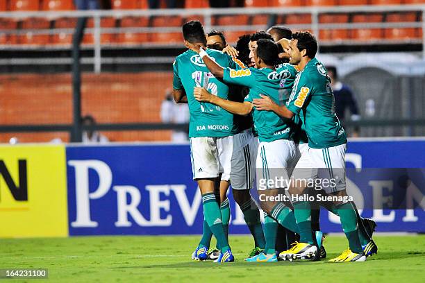 Players of Palmeiras celebrate a goal against Botafogo during a match between Palmeiras and Botafogo as part of the Paulista Championship 2013 at...