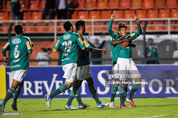 Players of Palmeiras celebrate a goal against Botafogo during a match between Palmeiras and Botafogo as part of the Paulista Championship 2013 at...