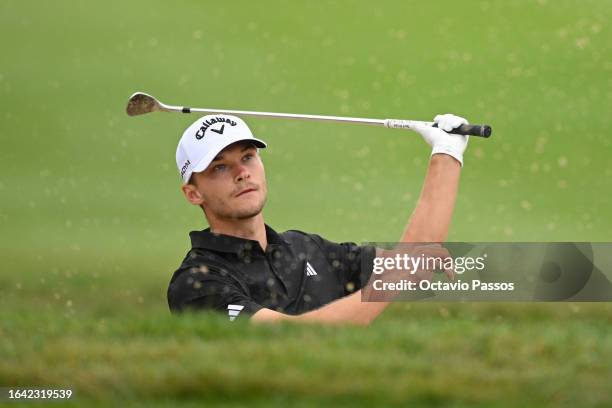 Nicolai Højgaard of Denmark plays a shot from a bunker on the sixth hole during Day Four of the D+D Real Czech Masters at Albatross Golf Resort on...