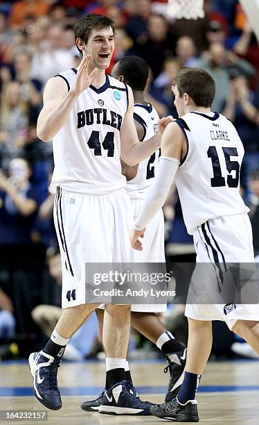 Andrew Smith and Rotnei Clarke of the Butler Bulldogs show camaraderie in the second half against the Bucknell Bison during the second round of the...