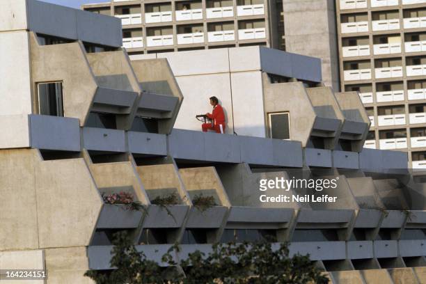Israeli Hostage Crisis: 1972 Summer Olympics: Police officer with gun, rifle on rooftop during crisis at 31 Connollystrasse in Olympic Village. 11...