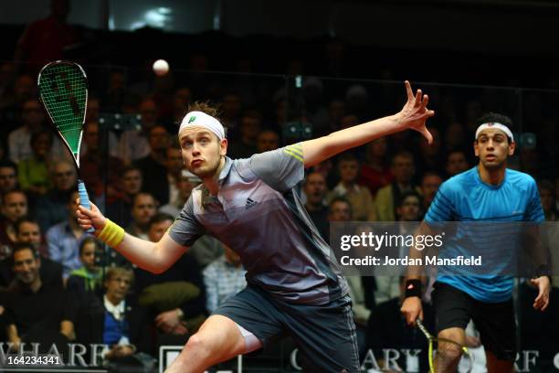 James Willstrop of England in action against Mohamed El Shorbagy of Egypt during their semi-final match in the Canary Wharf Squash Classic on March...