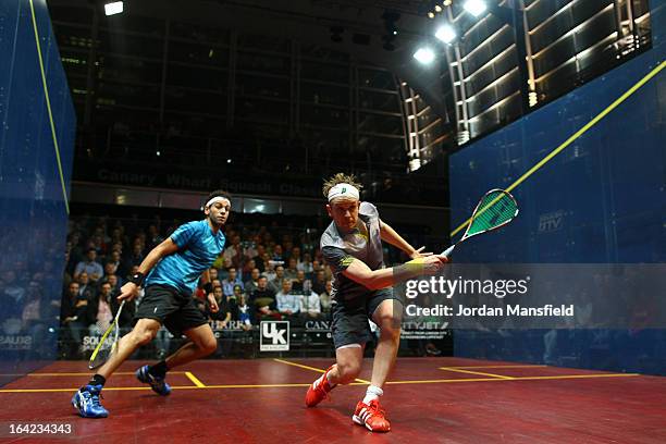 James Willstrop of England in action against Mohamed El Shorbagy of Egypt during their semi-final match in the Canary Wharf Squash Classic on March...