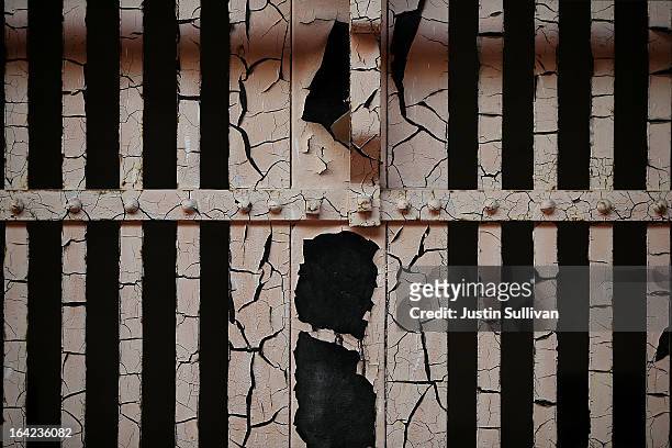 Paint peels off the bars of a cell at Alcatraz Island on March 21, 2013 in San Francisco, California. The National Park Service marked the 50th...