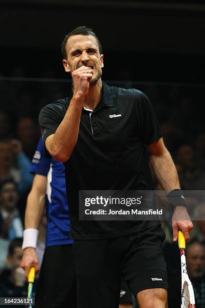 Peter Barker of England celebrates after beating Nick Matthew of England in their semi-final match in the Canary Wharf Squash Classic on March 21,...