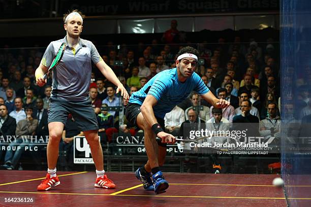 Mohamed El Shorbagy of Egypt in action against James Willstrop during their semi-final match a in the Canary Wharf Squash Classic on March 21, 2013...