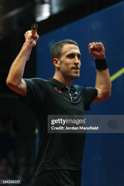 Peter Barker of England celebrates after beating Nick Matthew of England in their semi-final match in the Canary Wharf Squash Classic on March 21,...