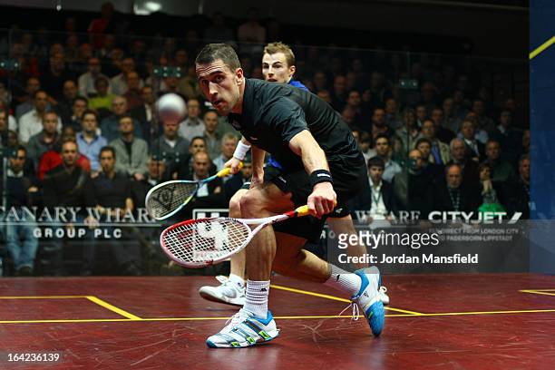 Peter Barker of England in action against Nick Matthew of England in their semi-final match in the Canary Wharf Squash Classic on March 21, 2013 in...