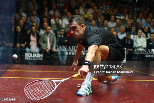 Peter Barker of England in action against Nick Matthew of England in their semi-final match in the Canary Wharf Squash Classic on March 21, 2013 in...