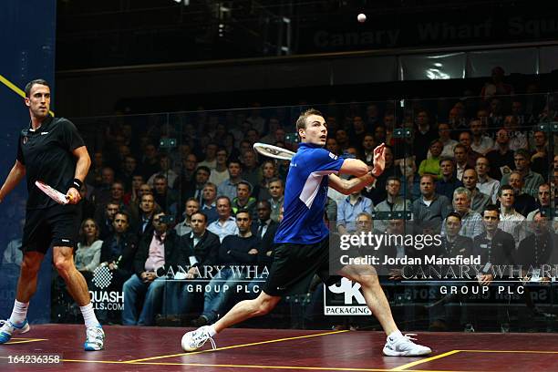 Nick Matthew of England in action against Peter Barker of England in their semi-final match in the Canary Wharf Squash Classic on March 21, 2013 in...