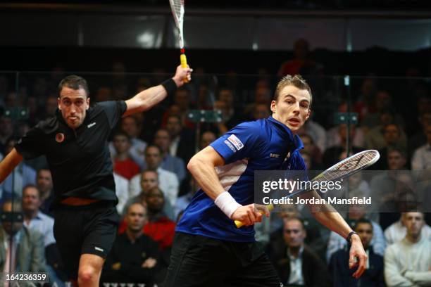 Nick Matthew of England in action against Peter Barker of England in their semi-final match in the Canary Wharf Squash Classic on March 21, 2013 in...